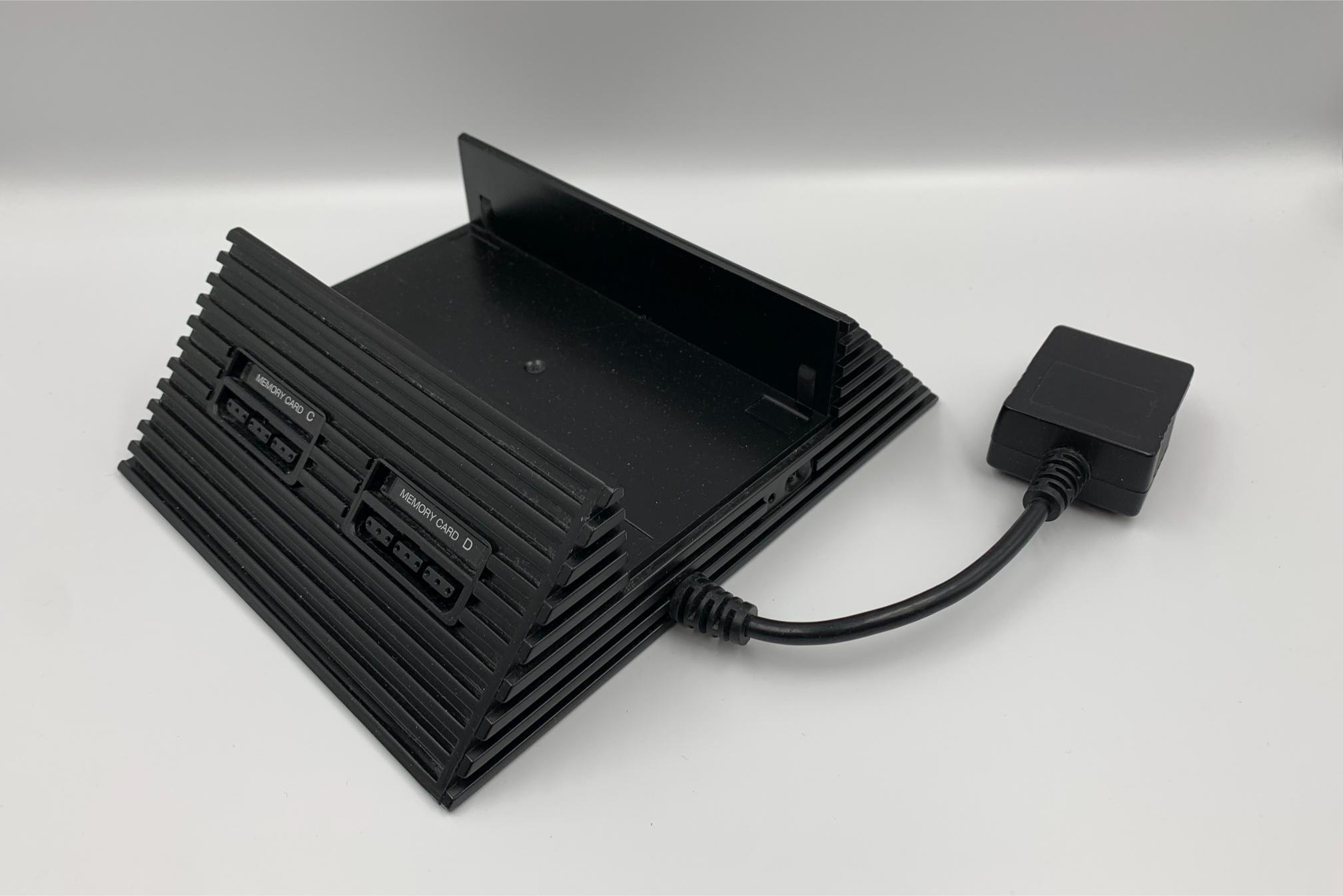 Playstation 2 Multitap + stand Nintendopusheren